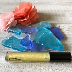 MAC goldyrocks yellow lip gloss